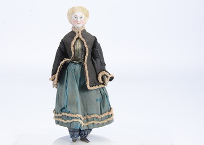 Lot 622 - An 19th century German bisque shoulder-head larger scale dolls’ house doll