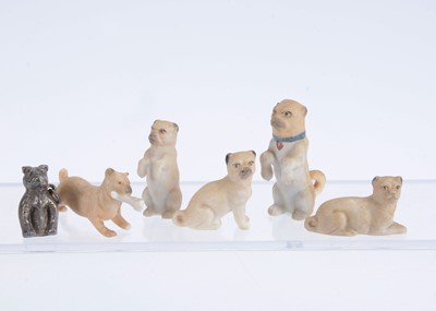 Lot 625 - Five German bisque dolls’ house pug dogs