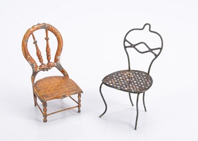 Lot 632 - An unusual 19th century painted tinplate dolls’ house chair