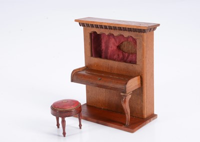 Lot 633 - An 19th century wooden dolls’ house wall climbing piano