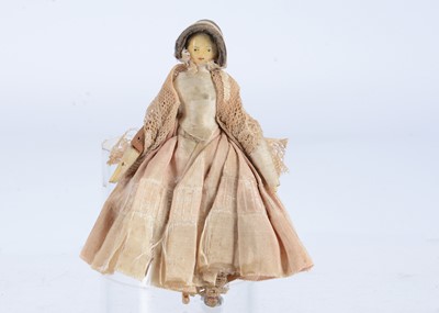 Lot 647 - An 19th century Grodnertal carved wooden dolls’ house doll