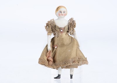 Lot 651 - A Simon & Halbig bisque shoulder-head dolls’ house doll
