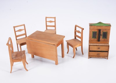Lot 654 - Four 19th century German pine dolls’ house kitchen chairs