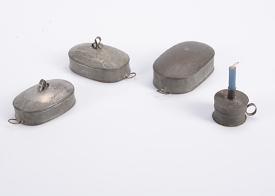 Lot 659 - A set of three 19th century tinplate dolls’ house meat plate covers
