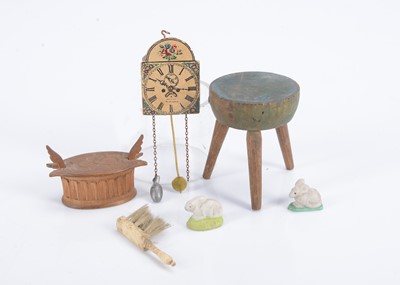 Lot 662 - A late 19th century miniature Scandinavian carved wooden dolls’ house butter box