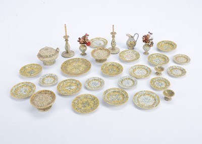 Lot 668 - An 19th century turned wooden and painted dolls’ house dinner service