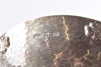Lot 9 - An arts and crafts Edward VII three handled cup