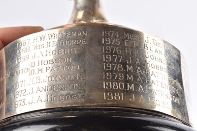 Lot 9 - An arts and crafts Edward VII three handled cup