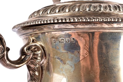 Lot 14 - A George V silver twin handled presentation trophy and cover