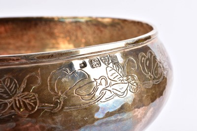 Lot 22 - A George V arts and crafts silver footed rose bowl