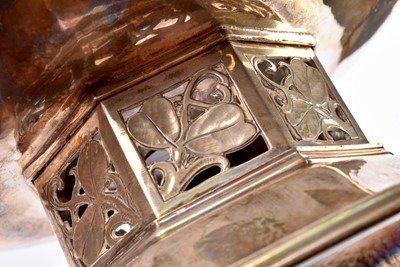 Lot 22 - A George V arts and crafts silver footed rose bowl