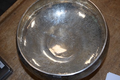 Lot 22 - A George V arts and crafts silver footed rose bowl