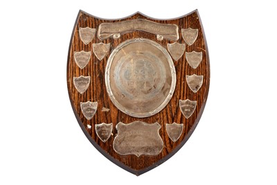 Lot 31 - A silver and oak presentation shield trophy