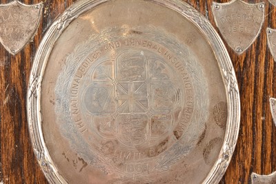 Lot 31 - A silver and oak presentation shield trophy