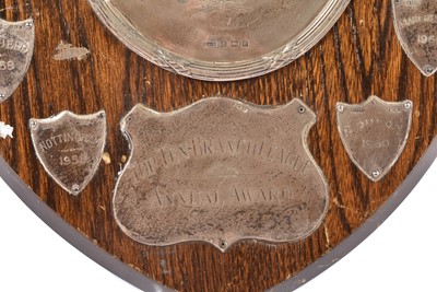 Lot 31 - A silver and oak presentation shield trophy