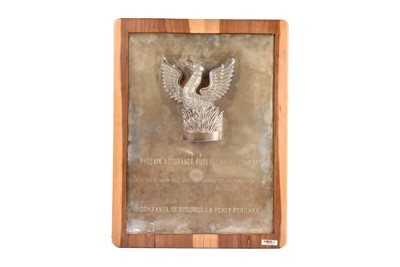 Lot 35 - A large Peruvian white metal and hardwood mounted rectangular plaque