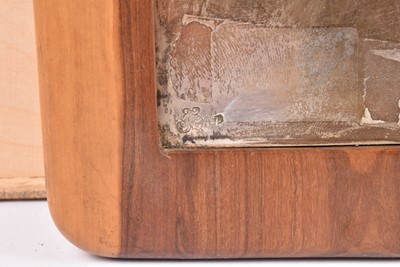 Lot 35 - A large Peruvian white metal and hardwood mounted rectangular plaque