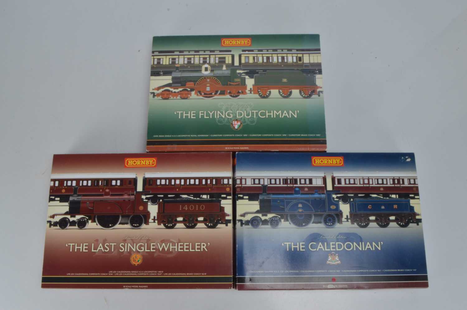 Lot 25 - Hornby (China) boxed 00 Gauge Limited Edition Caledonian LMS and Great Western Train Packs all with Single 4-2-2 Locomotive and Tender and two Coaches (3 packs)