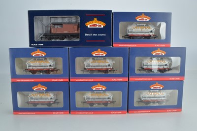 Lot 242 - Bachmann boxed 00 Gauge National silver 14-Ton Tank wagons and Brake Van (8)