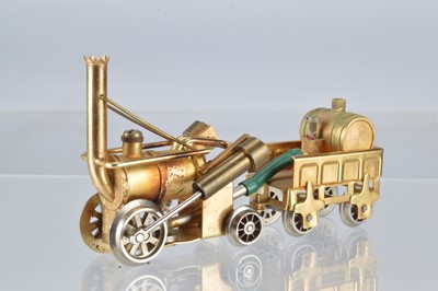 Lot 249 - 00 Gauge Brass L S Loc Swiss made live Steam Stephenson's Rocket Locomotive and gold plated Tender