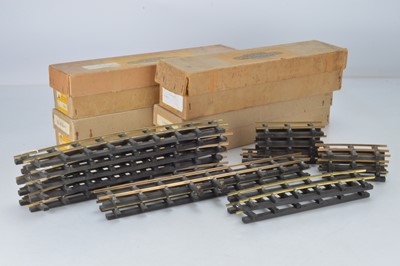 Lot 574 - Bassett Lowke O Gauge track together with power units and Bassett Lowke reverse power controls, (11)