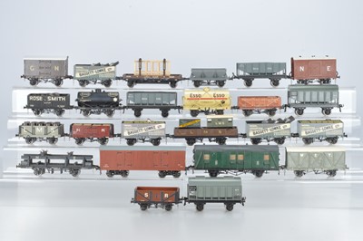 Lot 596 - Kit / scratch  and commercial built course scale O Gauge freight rolling stock, comprising 4 x Bassett Lowke open wagons, LMS, N.E, some with detachable loads, (24) 