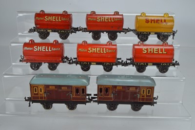 Lot 822 - Bing O Gauge rolling stock comprising 5 x SHELL tankers in red, 1 x SHELL tanker in yellow and 2 x freight vans, (8)