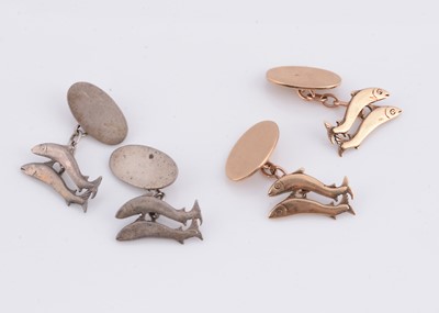 Lot 28 - Two pairs Shetland Silvercraft jumping salmon cufflinks, pair in 9ct gold & one pair in sterling silver