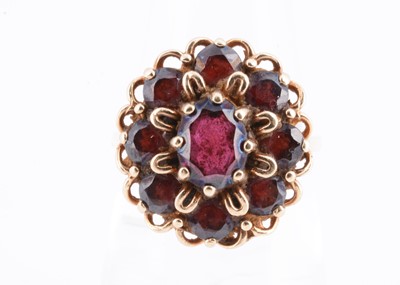 Lot 33 - A 9ct gold garnet flower cluster dress ring