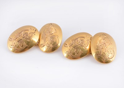 Lot 84 - A pair of 18ct gold monogrammed cufflinks