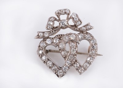 Lot 99 - A Victorian double heart diamond set brooch