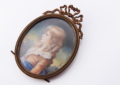 Lot 111 - An antique oval miniature portrait on ivory in standing frame