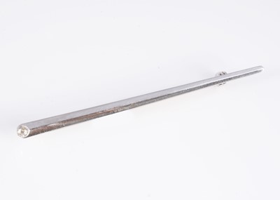 Lot 132 - A 9ct white gold diamond set bar brooch