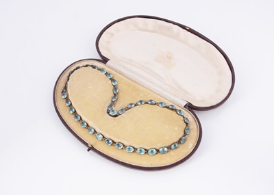 Lot 142 - An antique silver mounted blue paste & topaz riviera style necklace