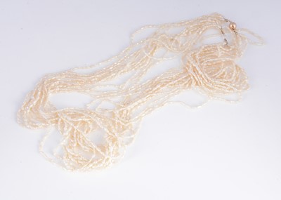 Lot 150 - A freshwater rice pearl long necklace with 14k gold ball clasp