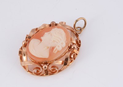 Lot 159 - A cameo pendant with scroll ribbon detail surround