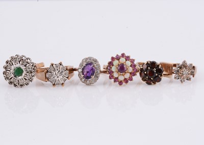 Lot 161 - A collection of six 9ct gold cluster dress rings