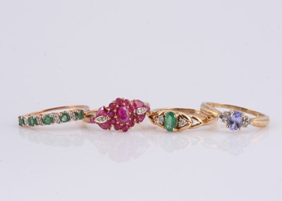 Lot 162 - A collection of four gem set dress rings