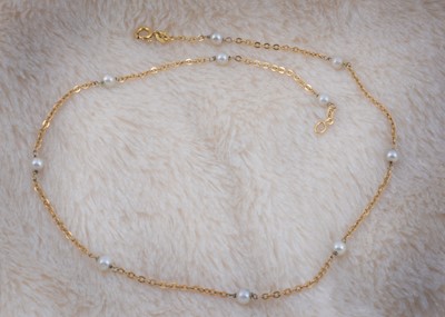 Lot 174 - An 18ct gold and pearl necklace