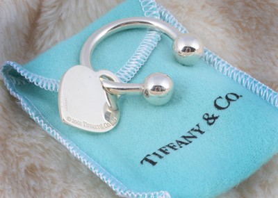 Lot 175 - A  silver Tiffany & Co heart tag horse shoe key ring