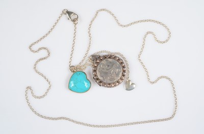 Lot 187 - A Lisa A Moss silver pendant with locket & heart turquoise