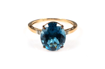 Lot 198 - A 9ct gold blue topaz & diamond set shouldered dress ring