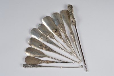 Lot 201 - Chinese Silver shoe horns and button hooks