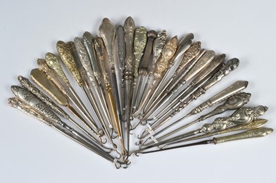 Lot 215 - Thirty steel button hooks