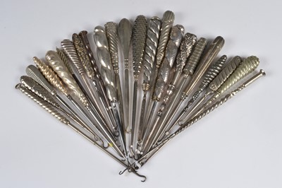 Lot 216 - Twenty steel button hooks