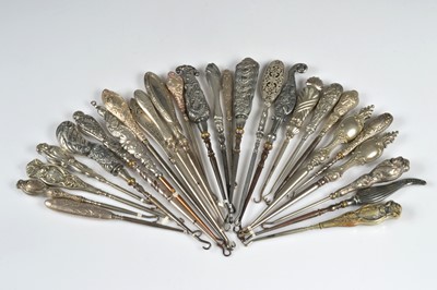 Lot 218 - Twenty seven steel button hooks