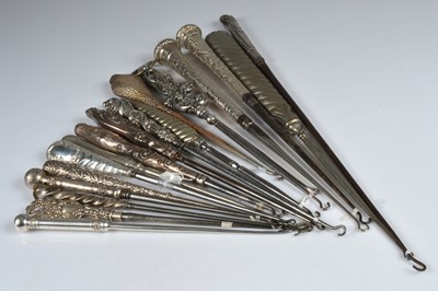 Lot 220 - Eighteen large steel button hooks