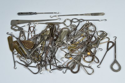 Lot 250 - A quantity of advertising and souvenir button hooks and loops