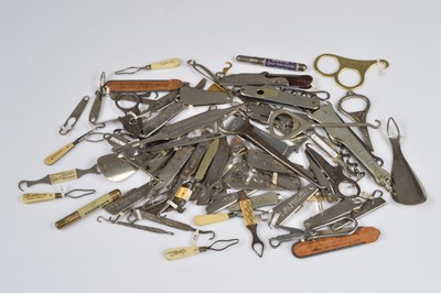 Lot 251 - A quantity of advertising and souvenir button hooks and loops