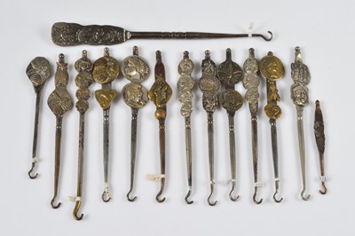 Lot 259 - A collection of late 19th and early 20th Century steel, lead and brass button hooks